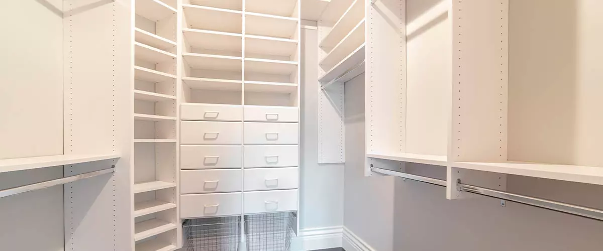 full white closet system custom made, empty shelves
