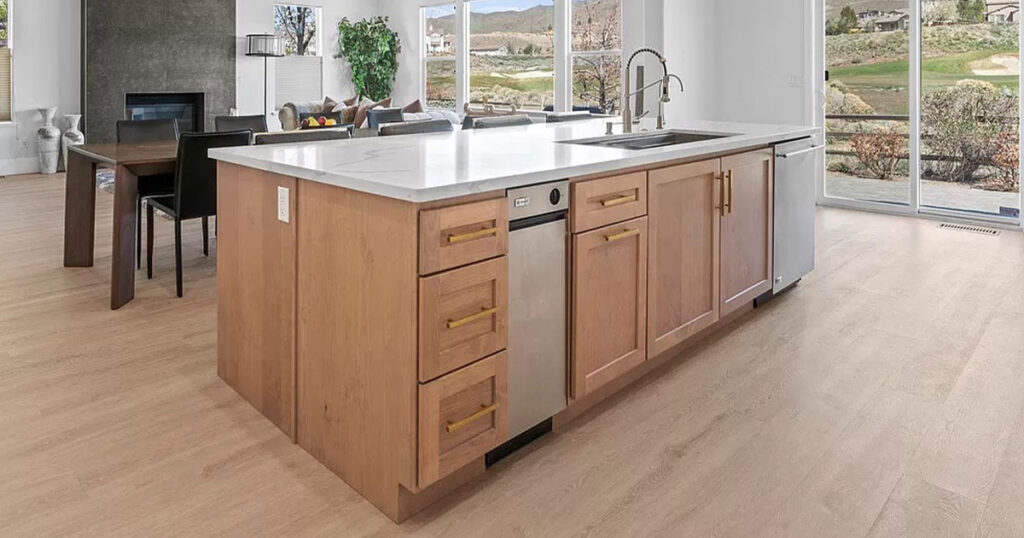 Kitchen wood cabinets with white countertop