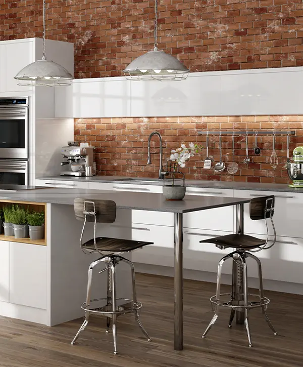 A stylish kitchen with modern appliances, a spacious layout, and under cabinet lighting