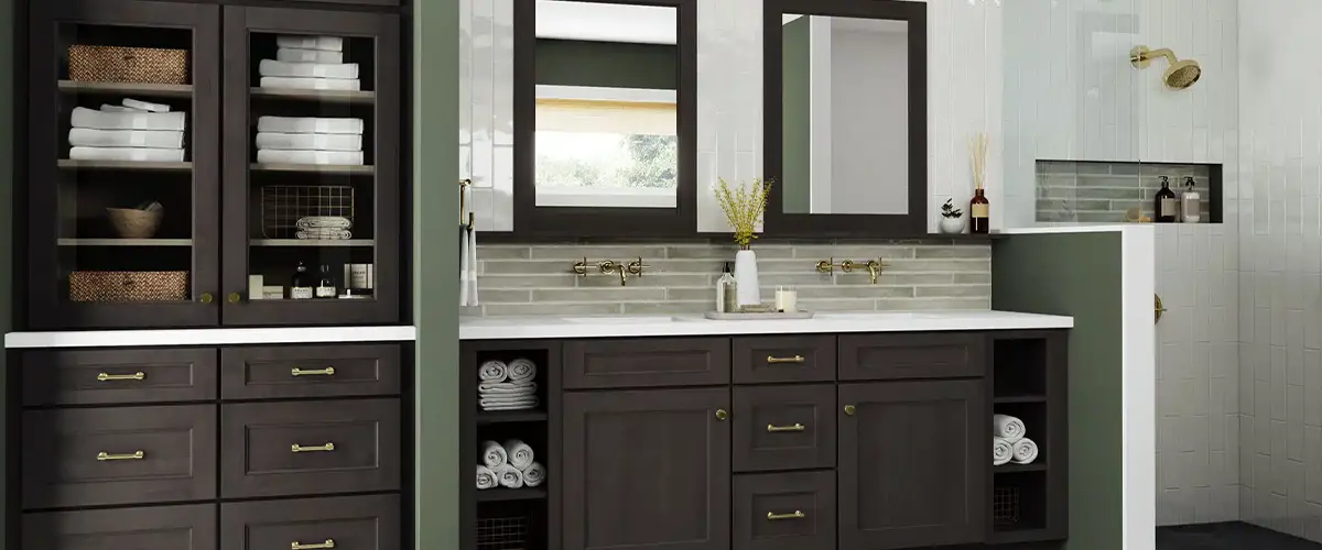 Modern bathroom design with dark wood cabinets, double vanity mirrors, and gold fixtures, featuring ample storage space.