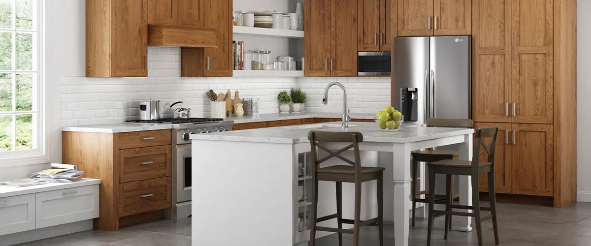 Traditional kitchen featuring oak cabinets, white subway tile backsplash, and a central island with seating.