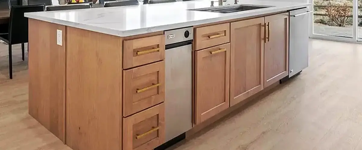 Custom kitchen island cabinets with wood finish and brass handles